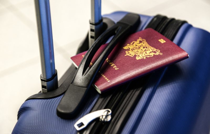 travel bag and a passport